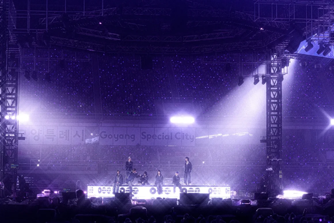 BTS onstage at ARIRANG world tour opening night in Goyang with purple concert lighting