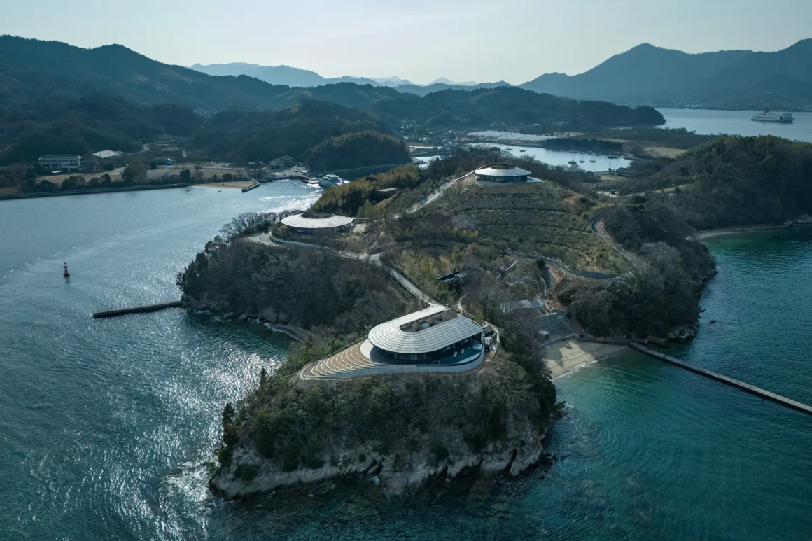 Wide aerial view of the three NOT A HOTEL Setouchi villas on Sagishima Island in Japan’s Seto Inland Sea.