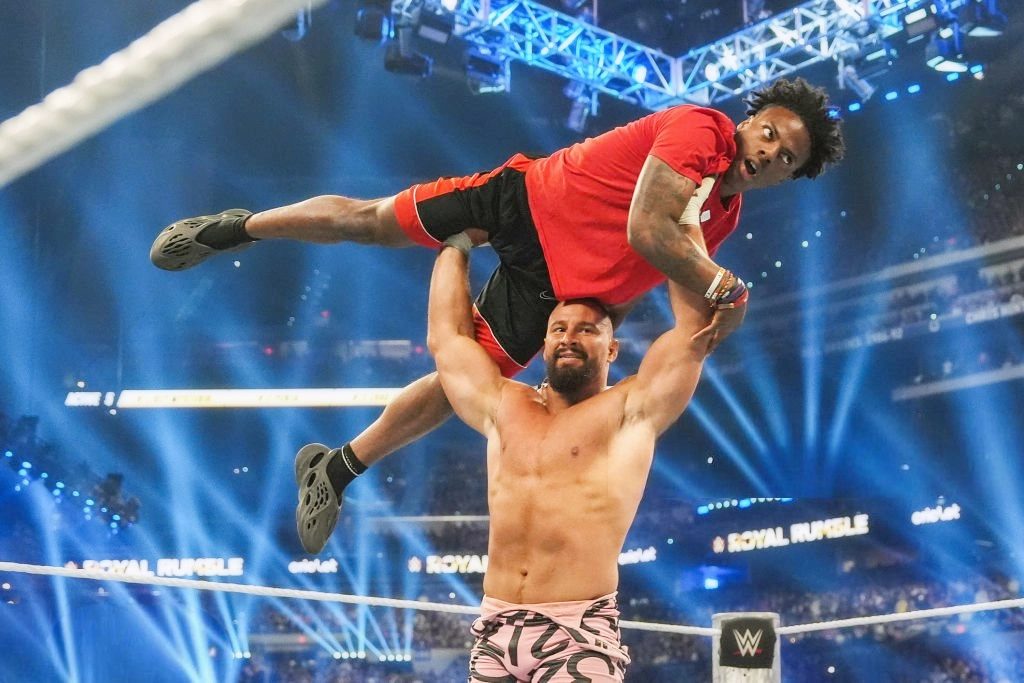 Bron Breakker lifting IShowSpeed inside a WWE ring during the Royal Rumble match in Indianapolis