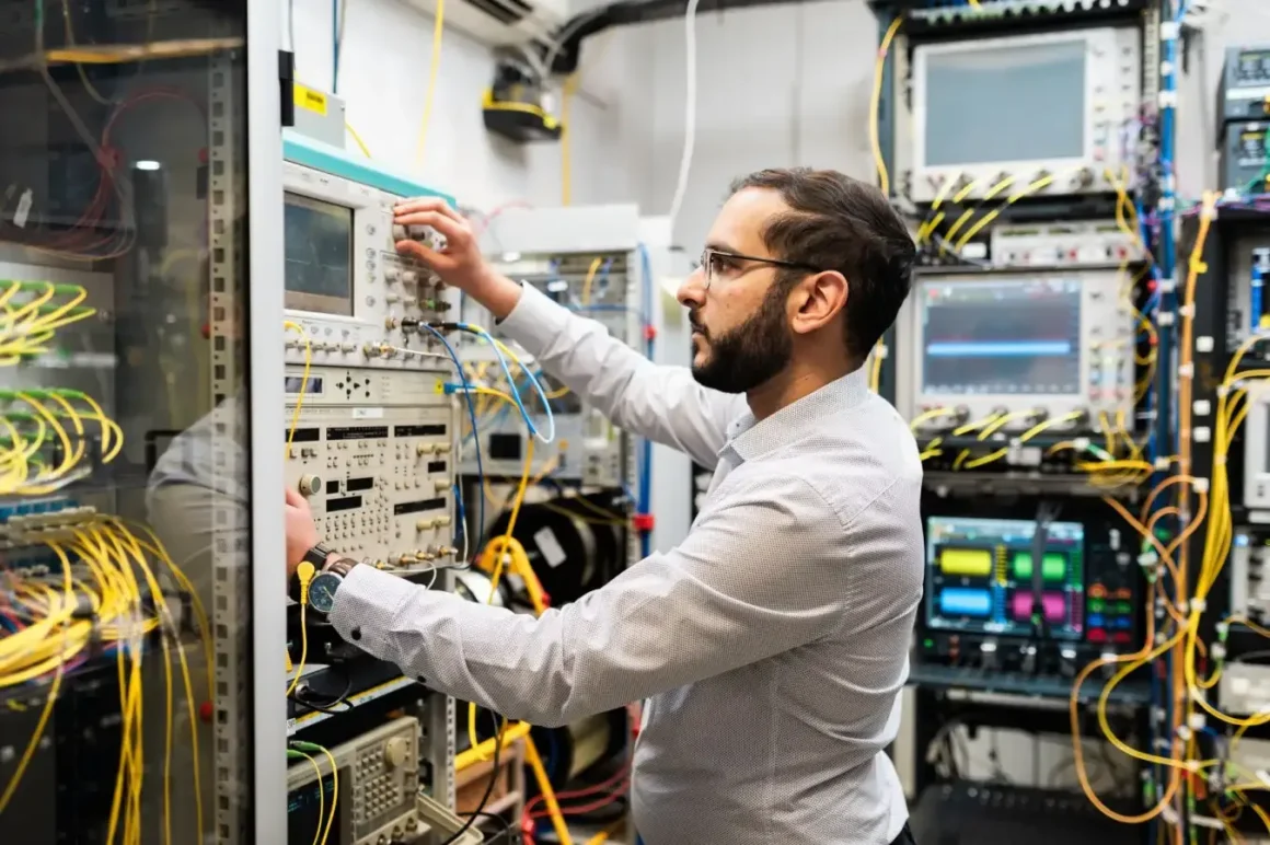 Ronit Sohanpal works on the high-speed data transmission setup - UCL