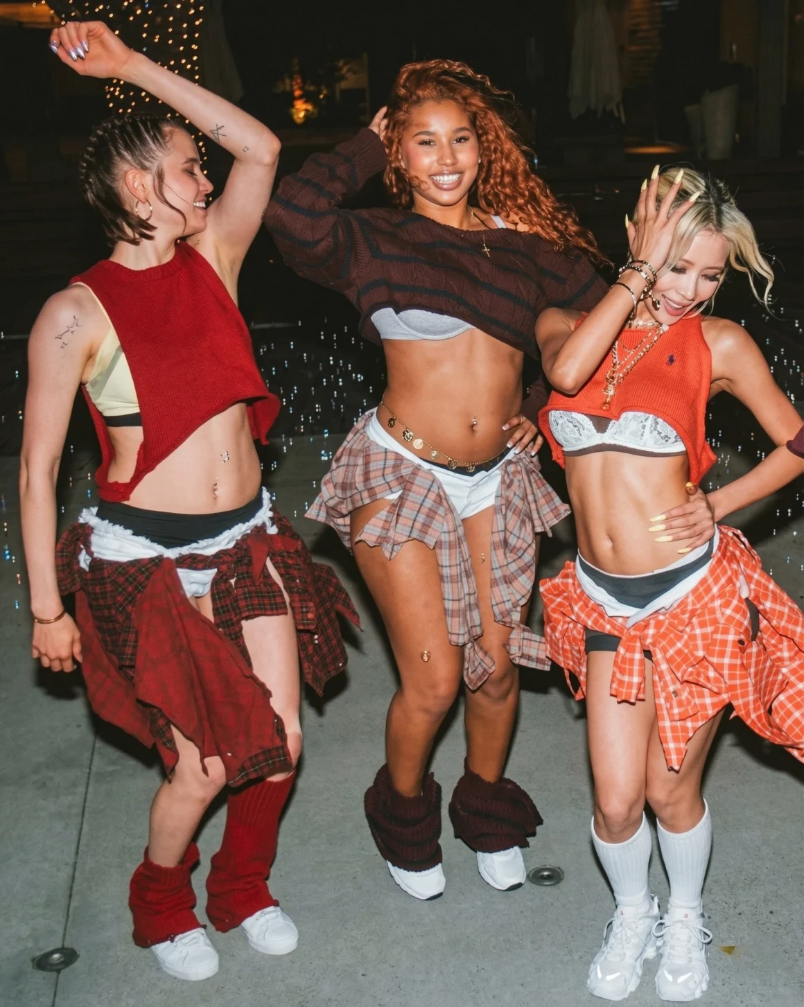Dance team performing in Dayoung music video with Shiloh Jolie in frame
