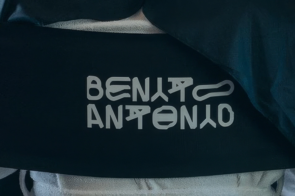 Close-up of the Benito Antonio logo detail inside Bad Bunny’s black custom Met Gala suit.